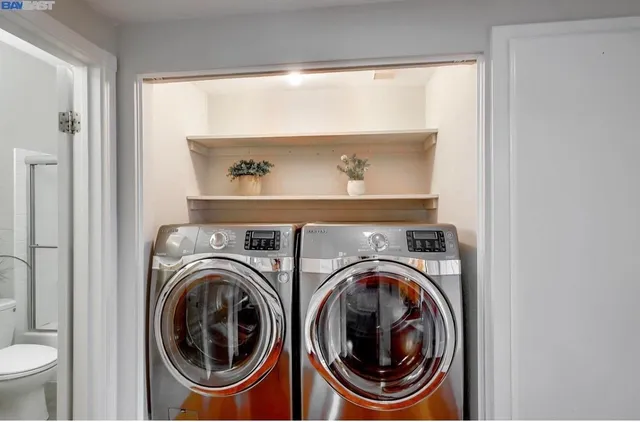 a utility room with dryer and washer