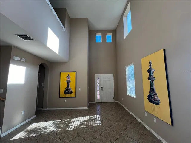 a view of an entryway door front of a house