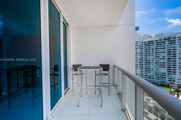 a balcony with a bench