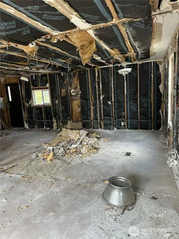 a view of a garage with an chairs