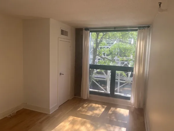 a view of empty room with front door