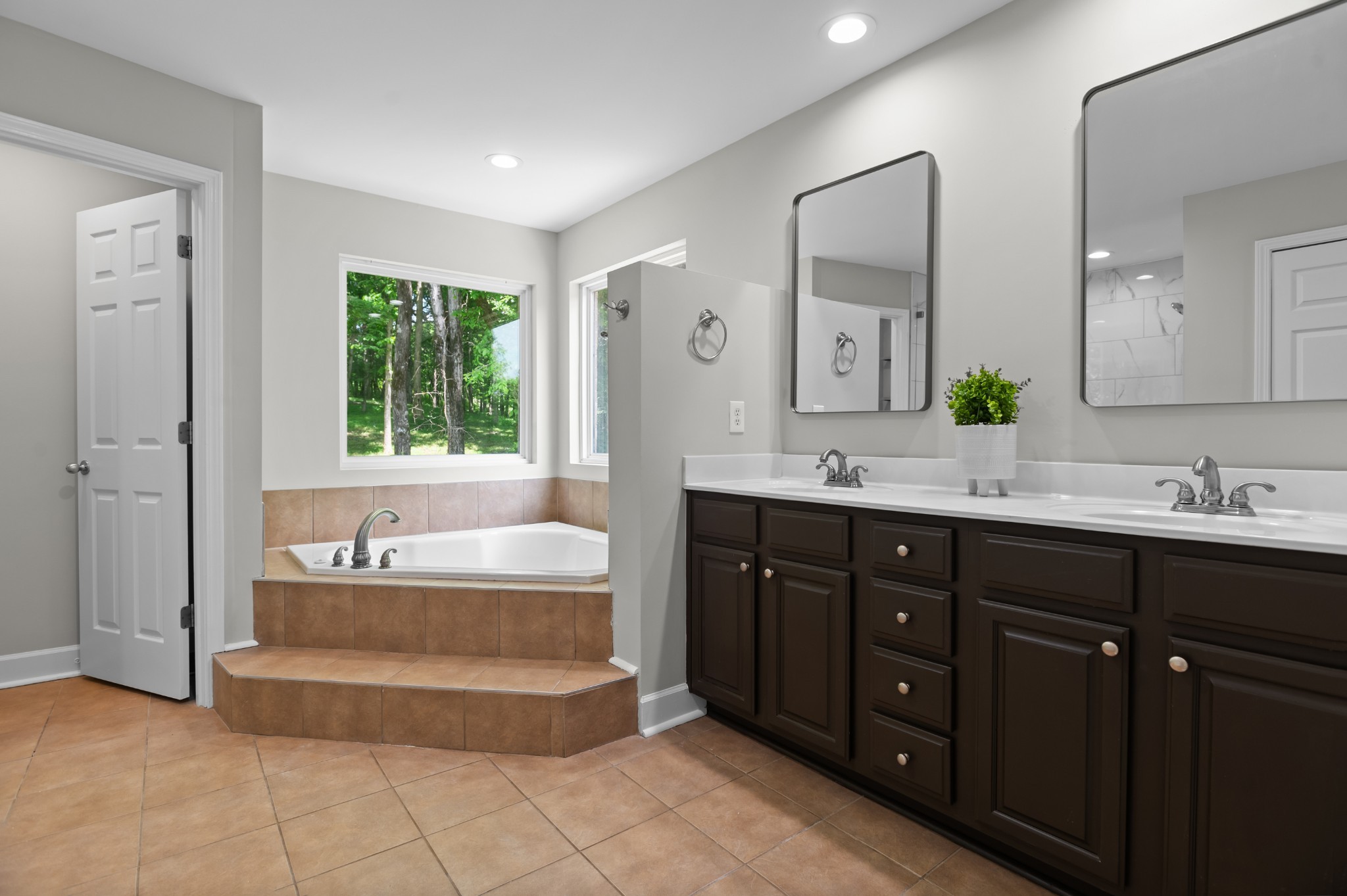 555 Flippen Road Lebanon, TN 37087 - Photo 13 of 54 a spacious bathroom with a tub sink and mirror