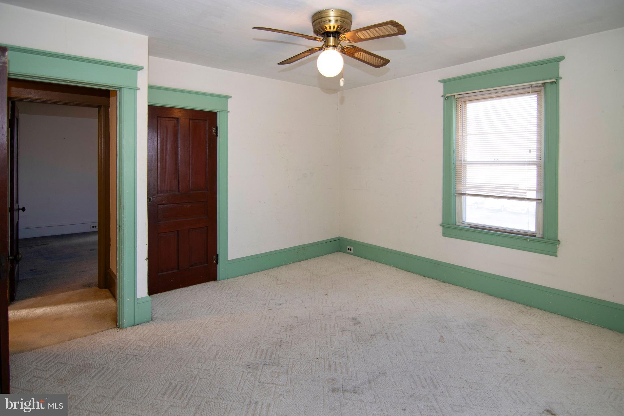 546 Williamstown Road Sicklerville, NJ 08081 - Photo 24 of 44 an empty room with windows and fan