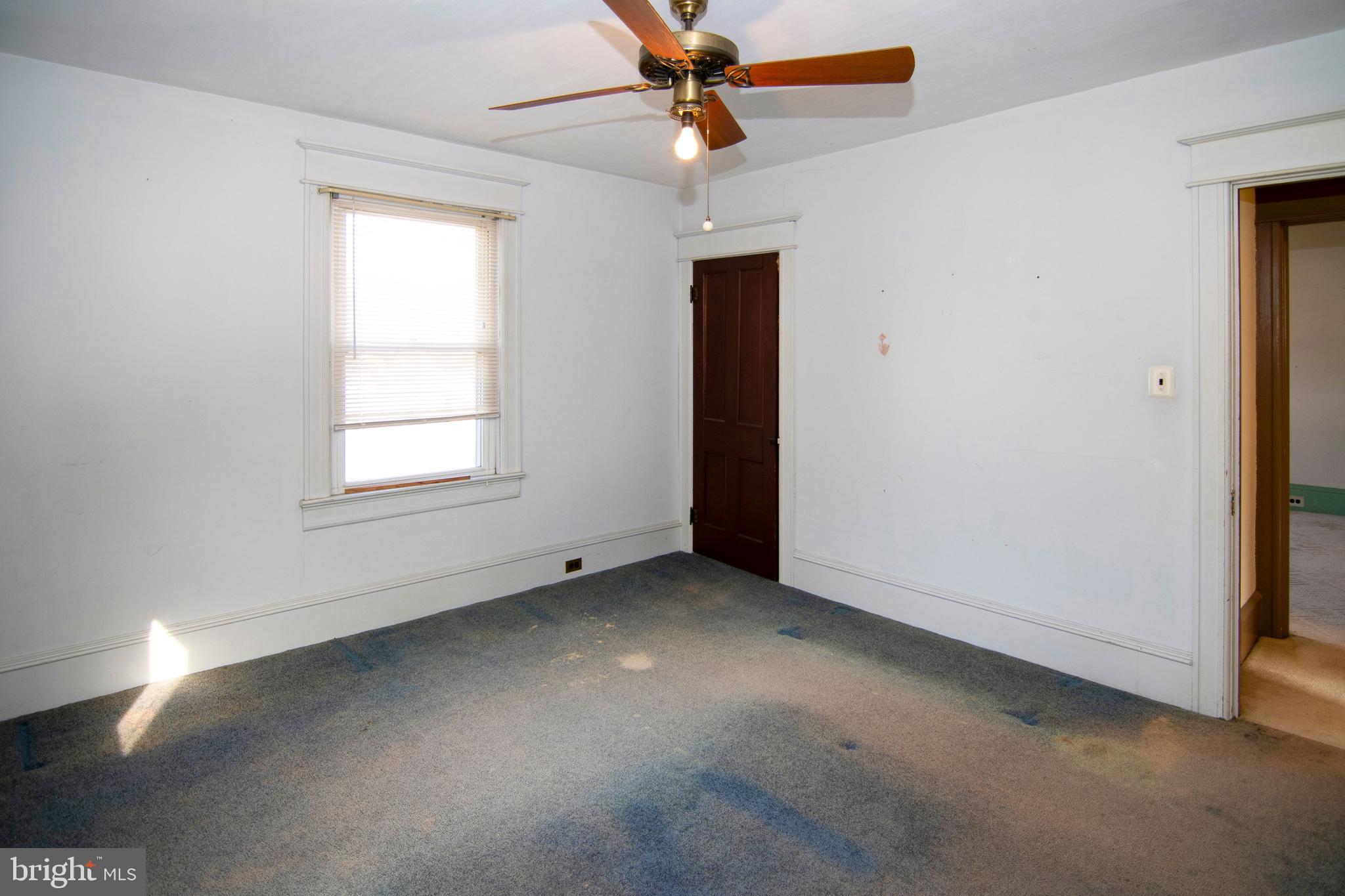 546 Williamstown Road Sicklerville, NJ 08081 - Photo 27 of 44 an empty room with windows and fan
