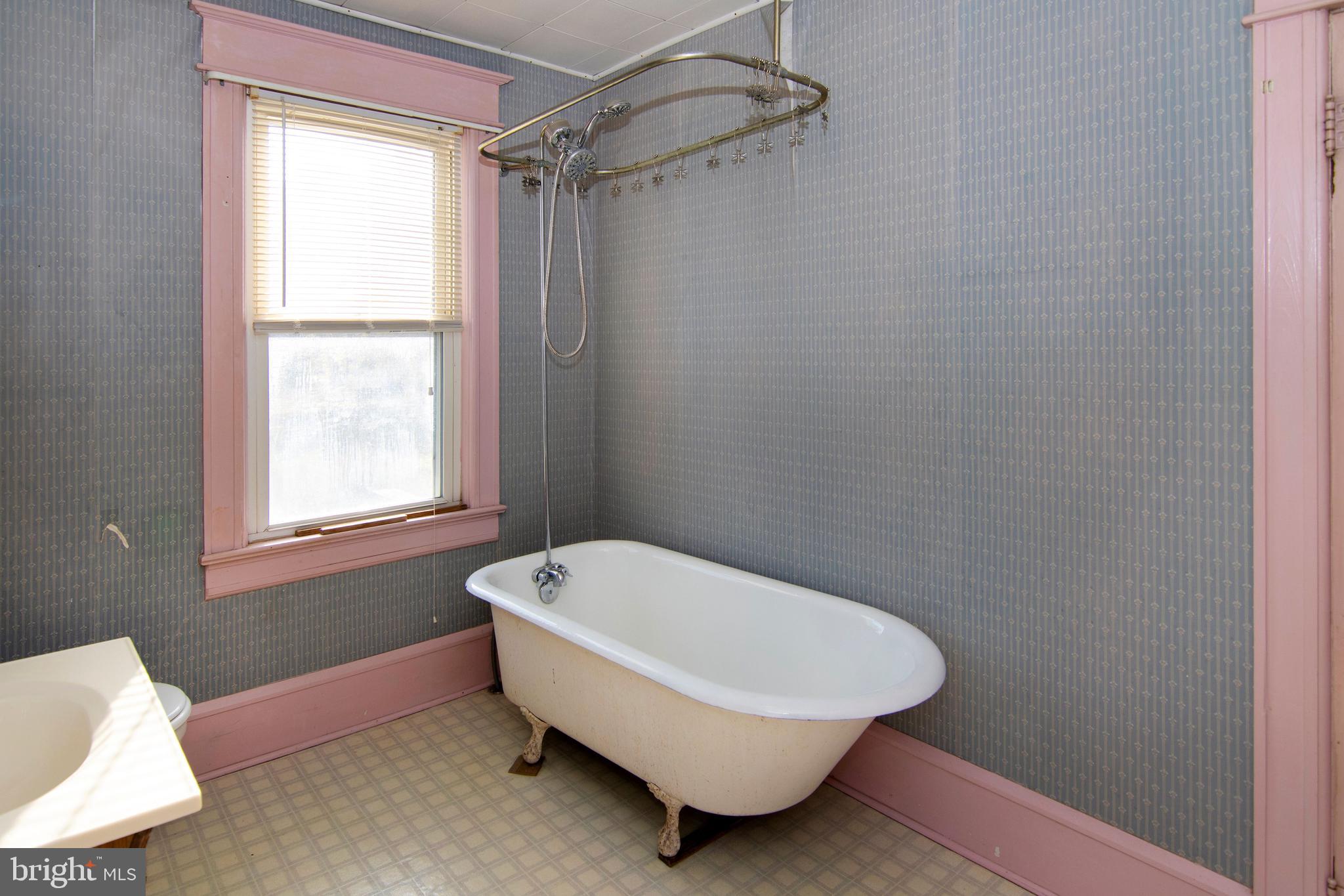 546 Williamstown Road Sicklerville, NJ 08081 - Photo 33 of 44 a white bath tub sitting in a bathroom next to a window