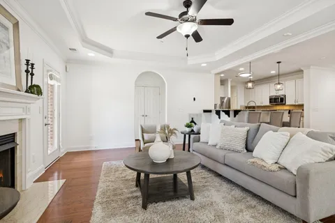 a bathroom with a double vanity sink a mirror and a shower