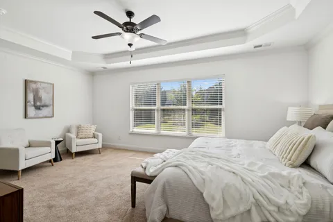 a view of a swimming pool with an outdoor space and seating area