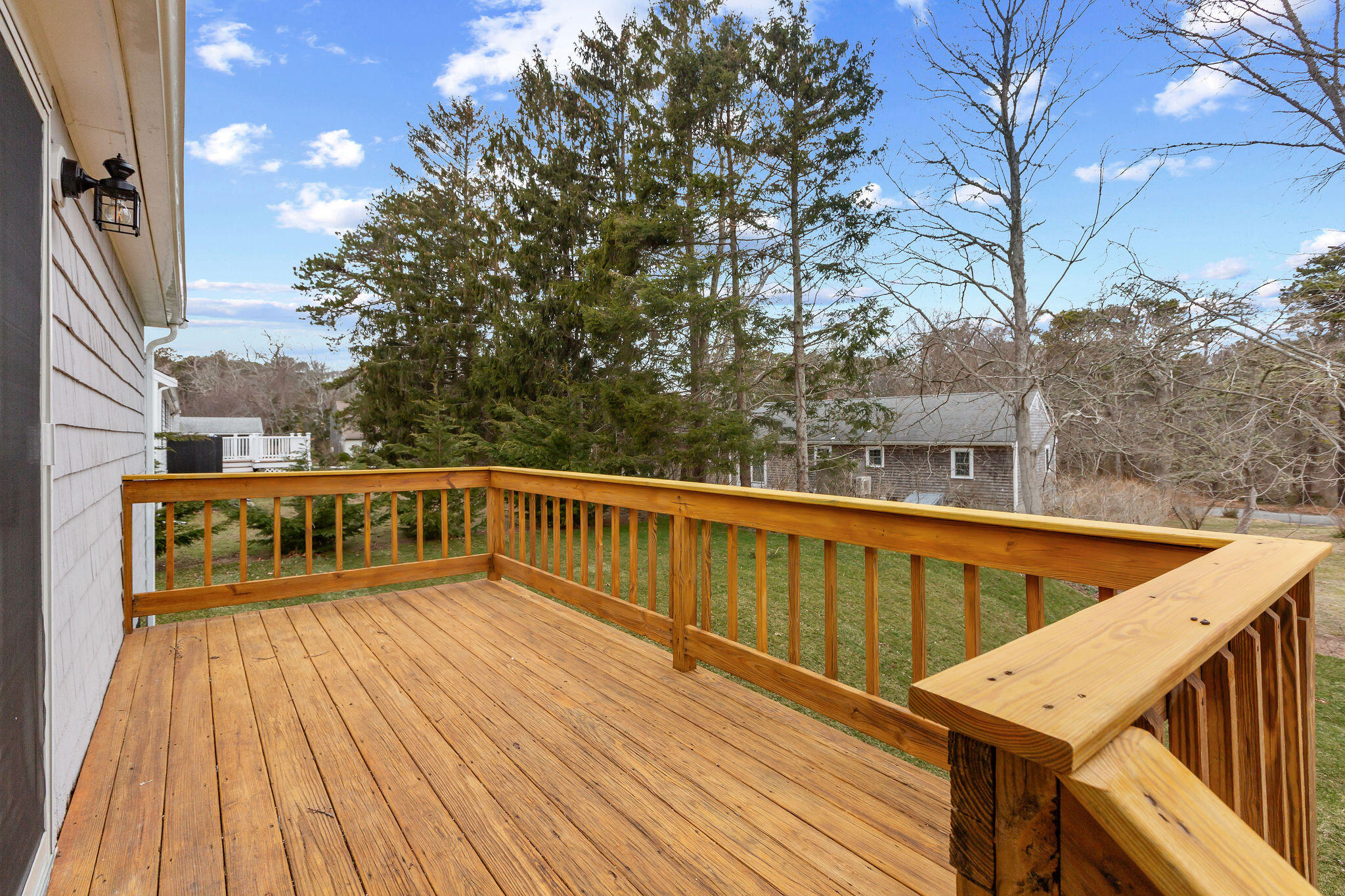 276 Scargo Hill Road South Dennis, MA 02660 - Photo 13 of 53 a view of balcony with wooden floor and fence