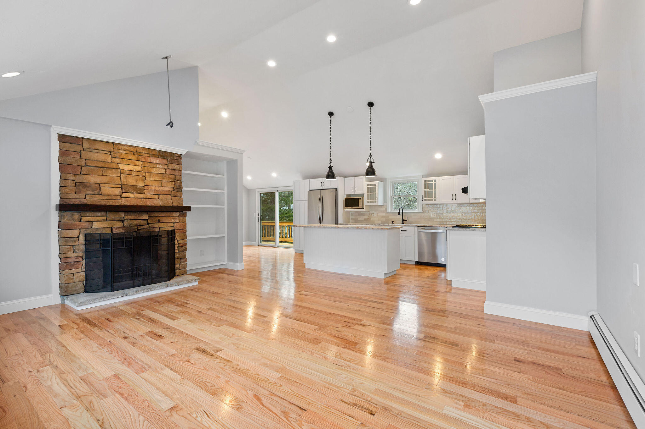 276 Scargo Hill Road South Dennis, MA 02660 - Photo 17 of 53 a view of kitchen with kitchen island view of living room and stove