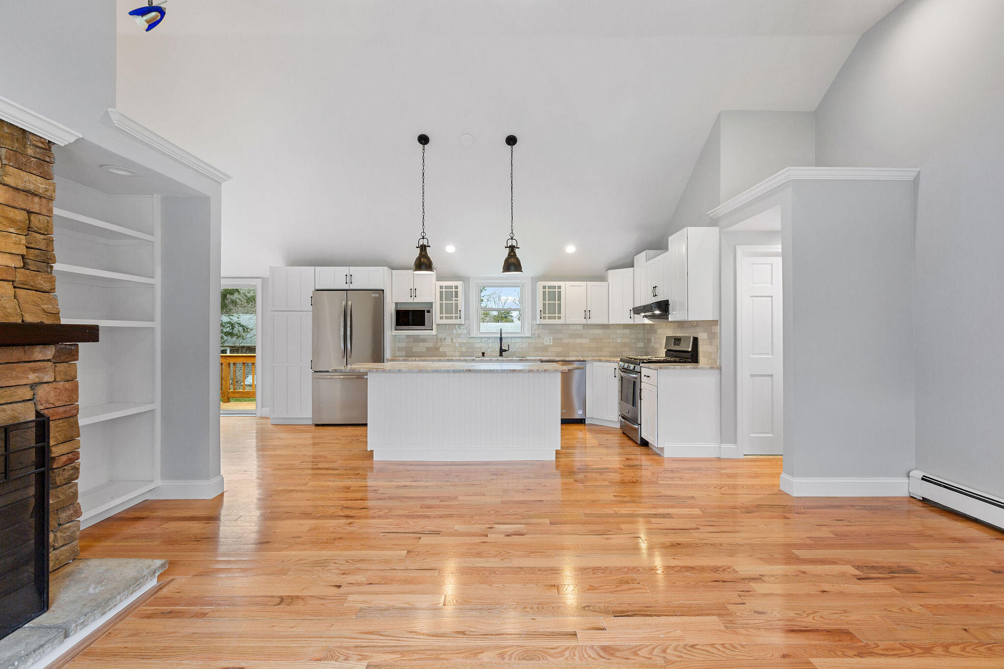 276 Scargo Hill Road South Dennis, MA 02660 - Photo 22 of 53 a large white kitchen with lots of counter space and appliances