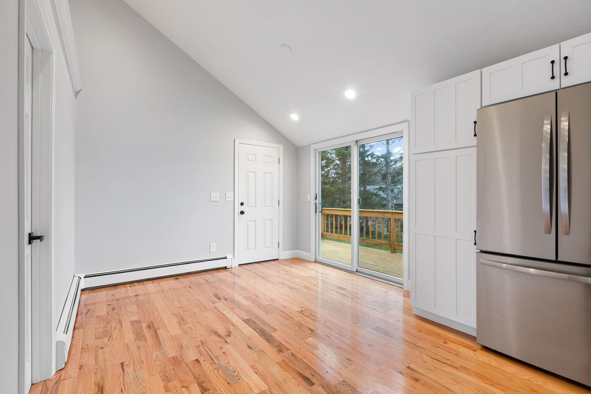 276 Scargo Hill Road South Dennis, MA 02660 - Photo 29 of 53 a view of an empty room with wooden floor and a window