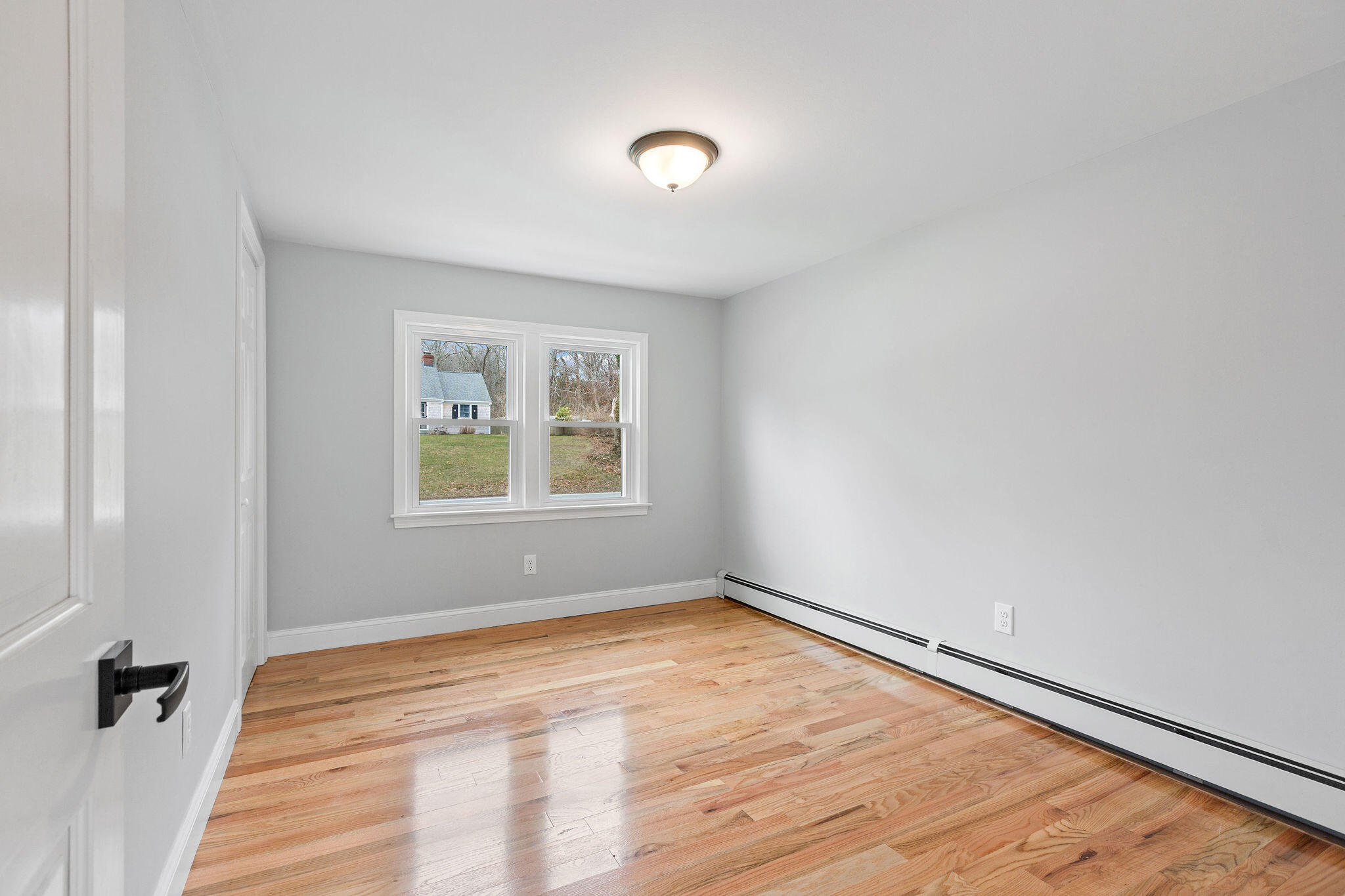 276 Scargo Hill Road South Dennis, MA 02660 - Photo 33 of 53 an empty room with a window
