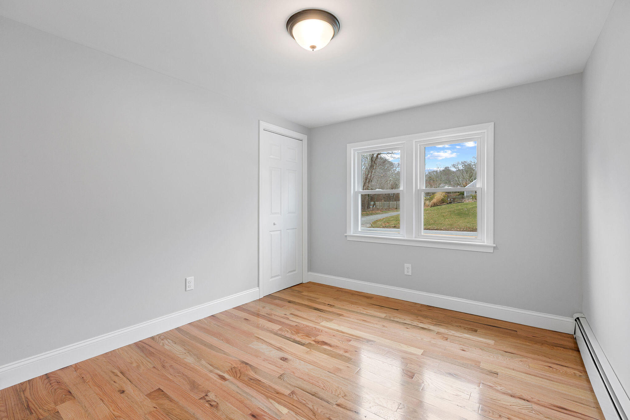 276 Scargo Hill Road South Dennis, MA 02660 - Photo 34 of 53 wooden floor in an empty room with a window