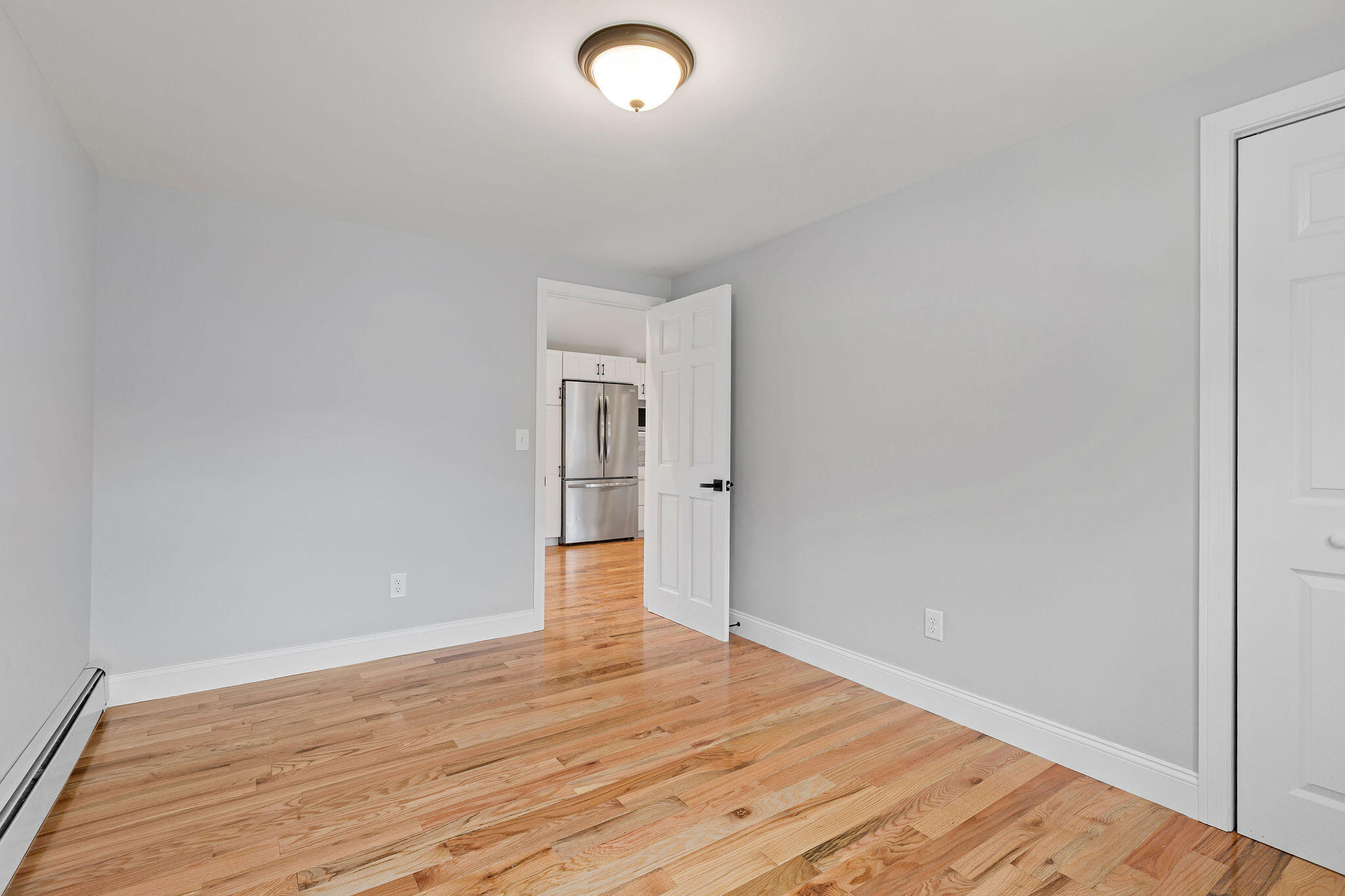 276 Scargo Hill Road South Dennis, MA 02660 - Photo 35 of 53 a view of an empty room and wooden floor
