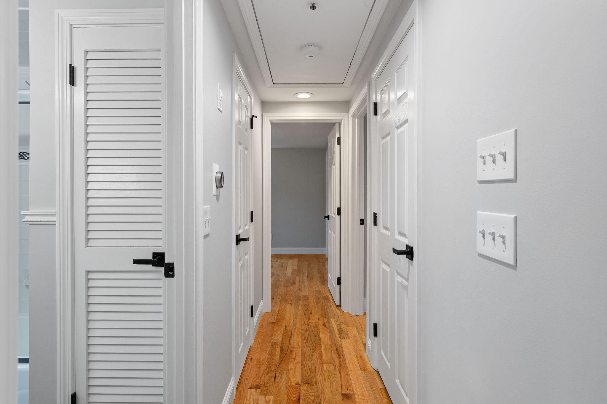 276 Scargo Hill Road South Dennis, MA 02660 - Photo 36 of 53 a view of a hallway with wooden floor and closet area