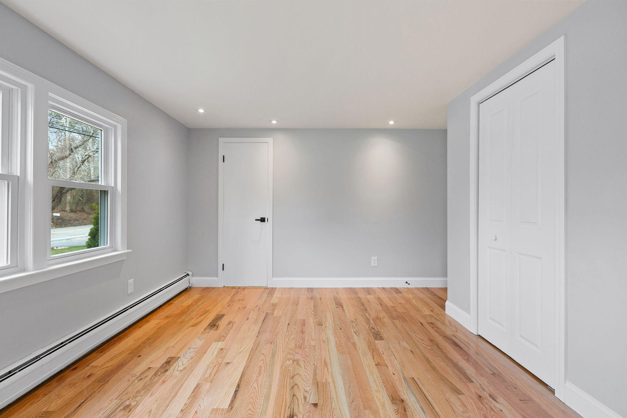 276 Scargo Hill Road South Dennis, MA 02660 - Photo 44 of 53 a view of empty room with wooden floor and fan