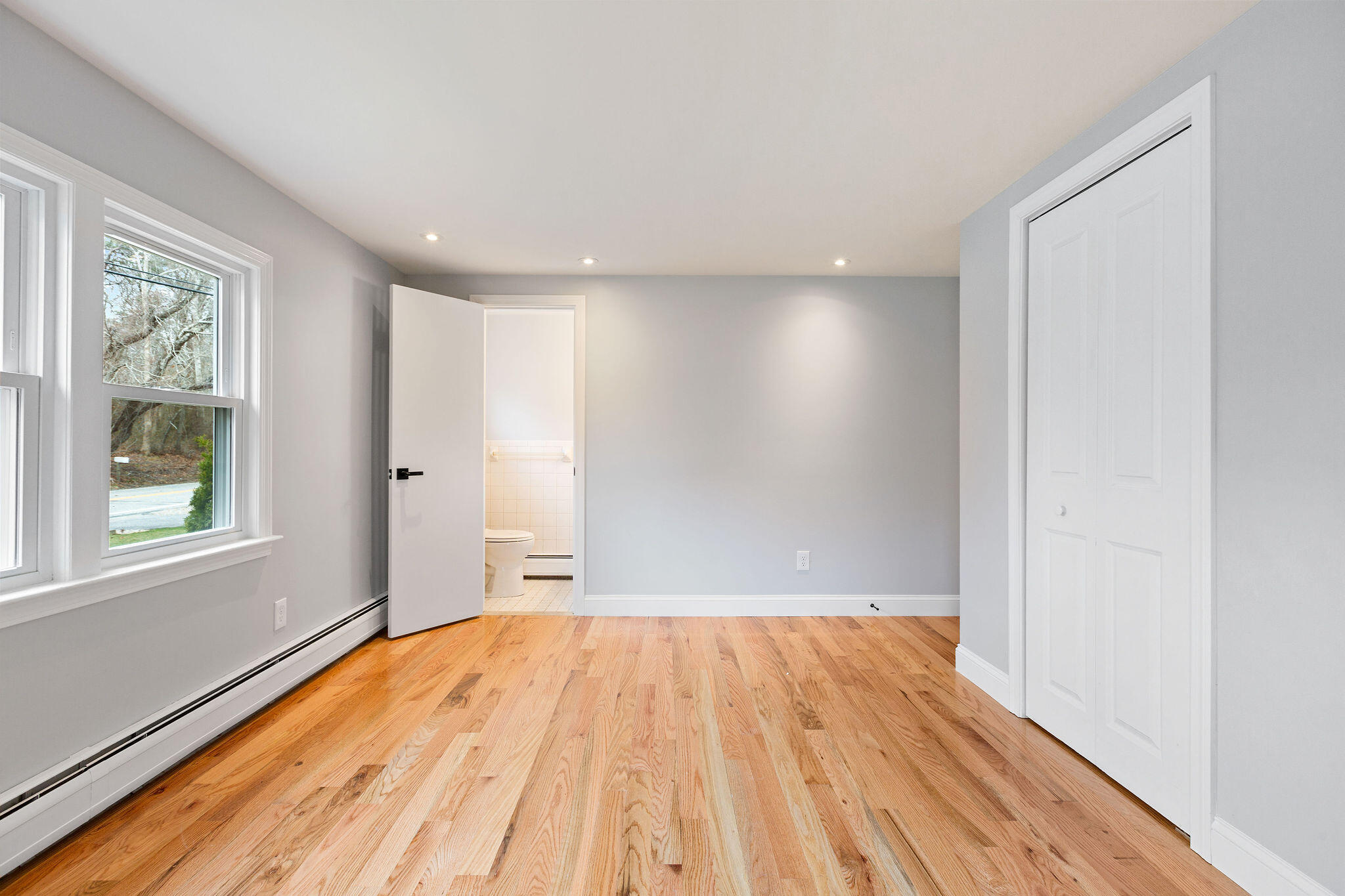 276 Scargo Hill Road South Dennis, MA 02660 - Photo 45 of 53 a view of empty room with wooden floor and fan