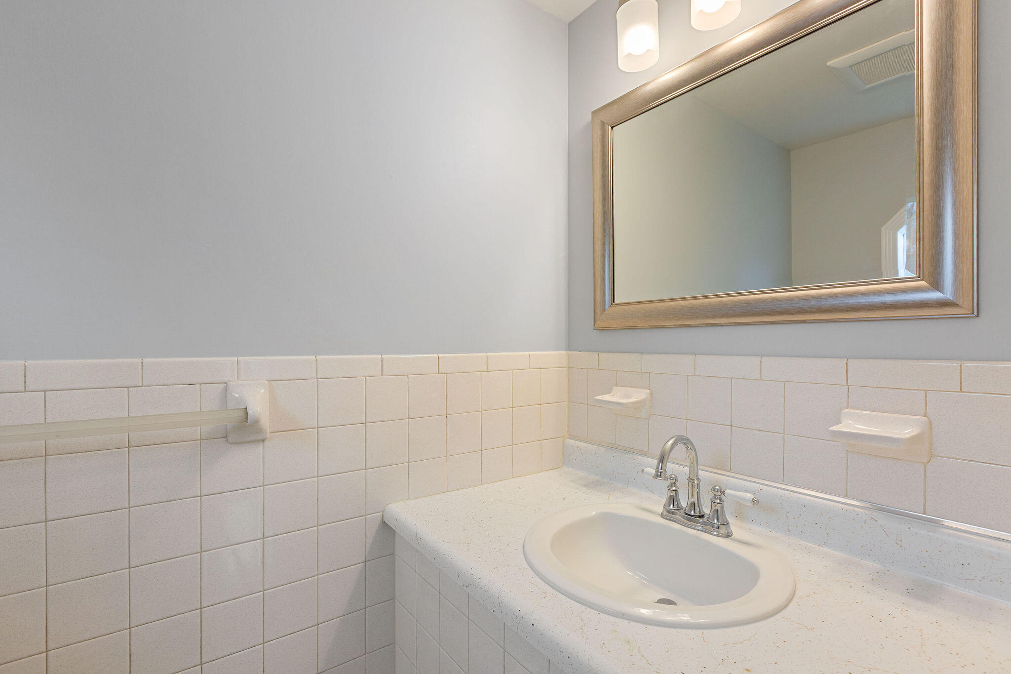 276 Scargo Hill Road South Dennis, MA 02660 - Photo 47 of 53 a bathroom with a sink and a mirror