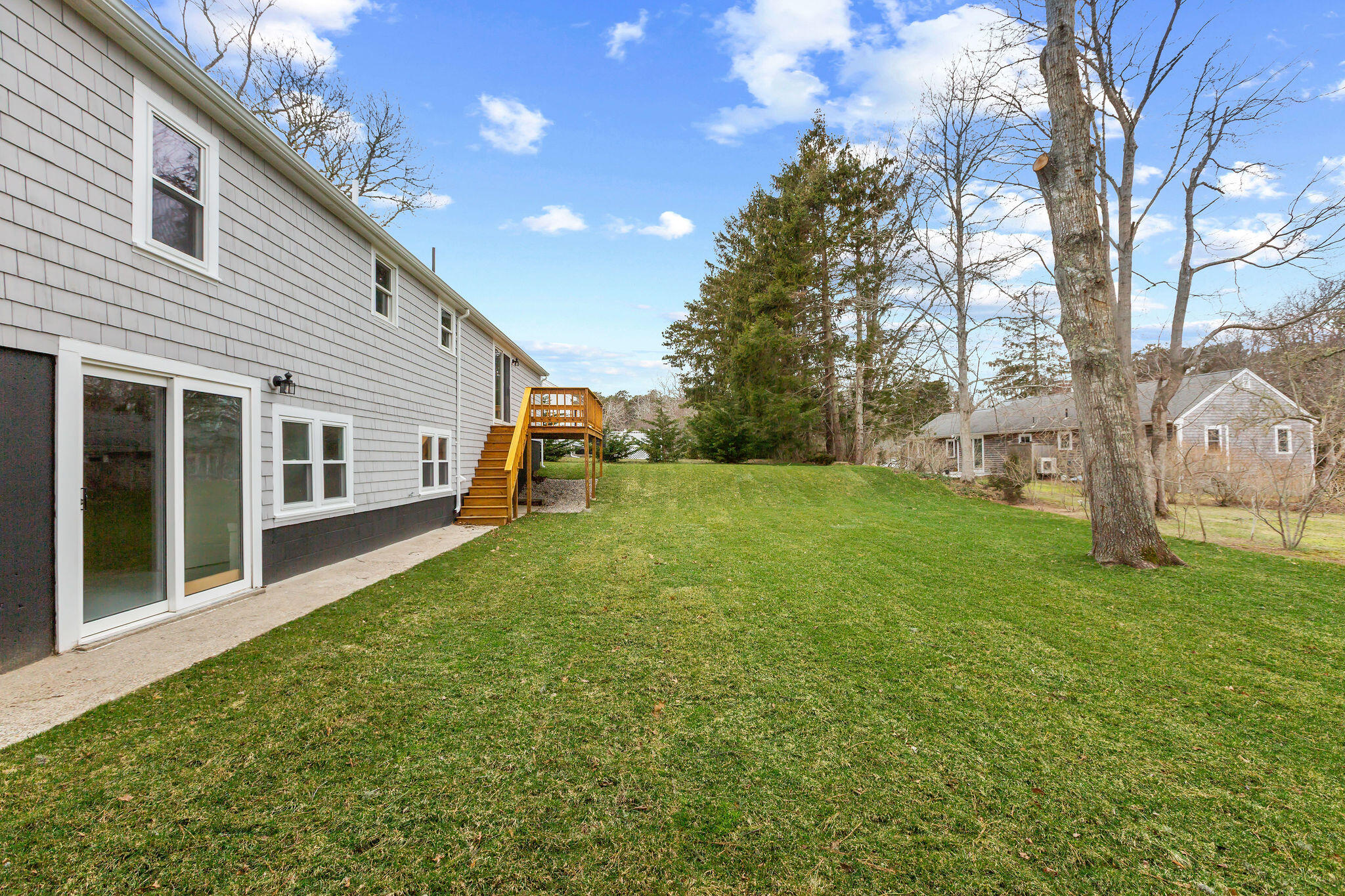 276 Scargo Hill Road South Dennis, MA 02660 - Photo 6 of 53 a view of a house with a back yard