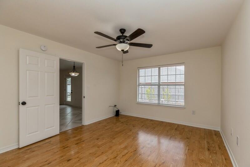84 Inlet Drive Miramar Beach, FL 32550 - Photo 21 of 38 a view of empty room with wooden floor and fan