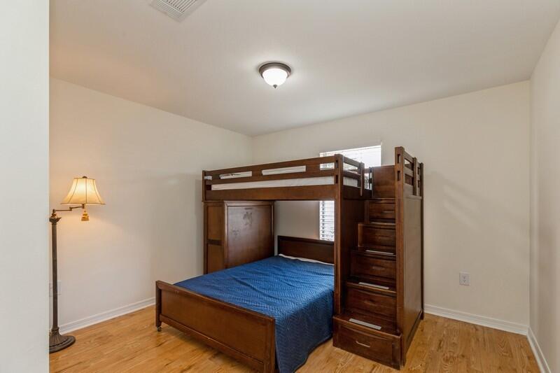 84 Inlet Drive Miramar Beach, FL 32550 - Photo 30 of 38 a bedroom with a bed and cabinets