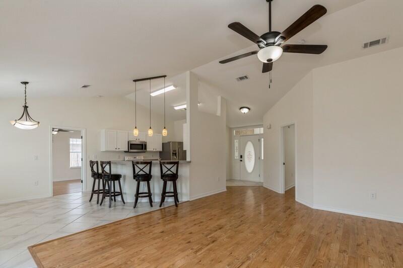 84 Inlet Drive Miramar Beach, FL 32550 - Photo 7 of 38 a view of a dining room with furniture and wooden floor