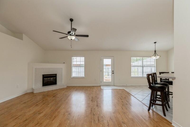 84 Inlet Drive Miramar Beach, FL 32550 - Photo 10 of 38 a living room with furniture and a fireplace
