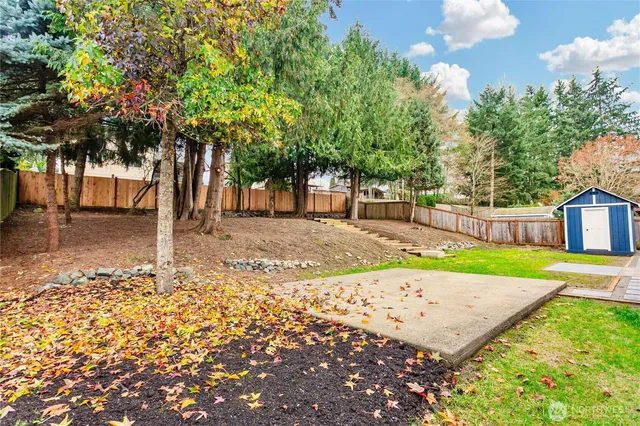 a view of a backyard with a garden