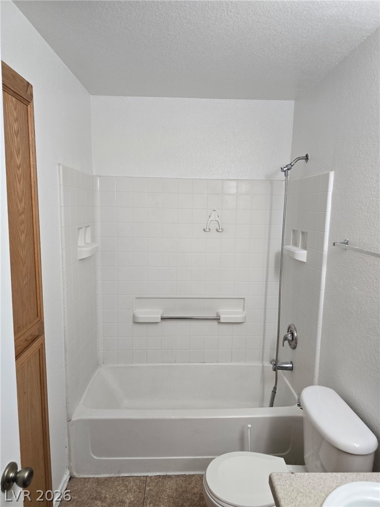 4730 East Craig Road, Unit 2142 Las Vegas, NV 89115 - Photo 7 of 8 This bright bathroom features a combined shower and bathtub for convenience and utility.