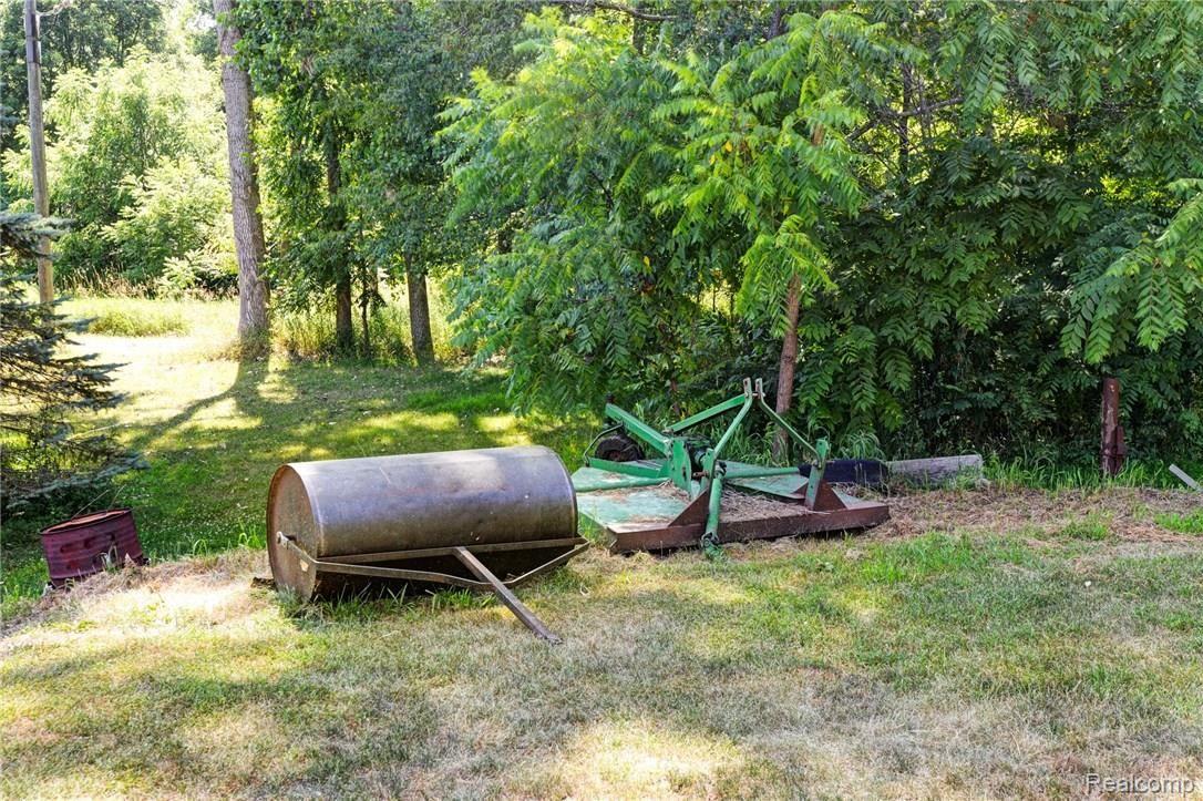 9675 Roberts Road Gregory, MI 48137 - Photo 9 of 33 60-inch roller and lawn-mowing deck can make quick work of the lawn.