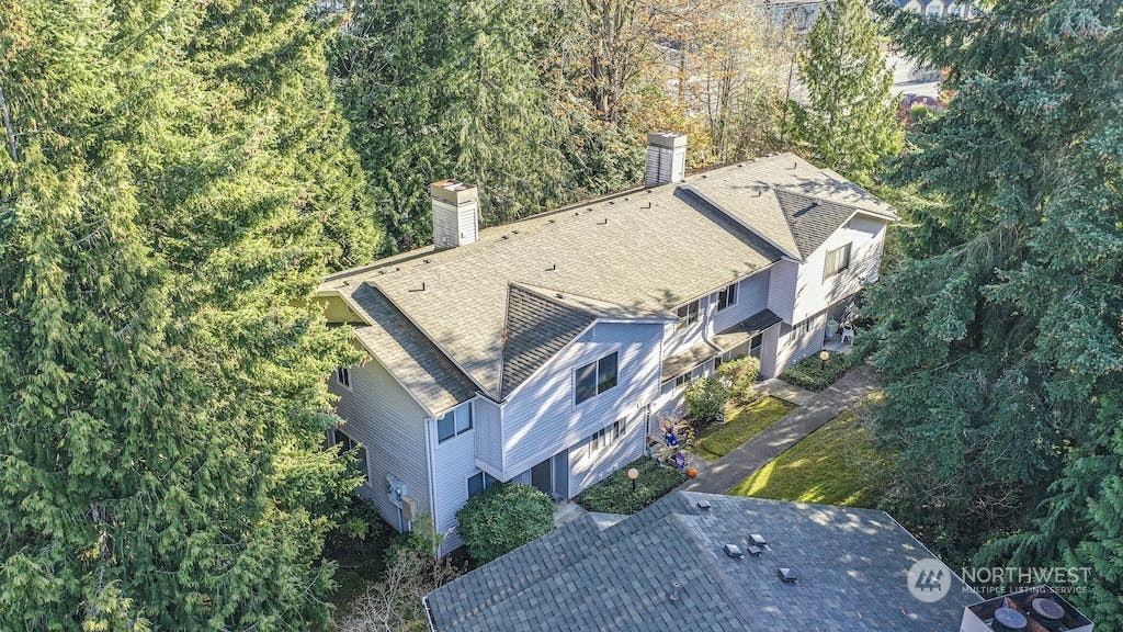 18910 Bothell Everett Highway, Unit D3 Bothell, WA 98012 - Photo 2 of 29 front view of a house with a yard