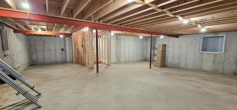 a view of swimming pool with a chair