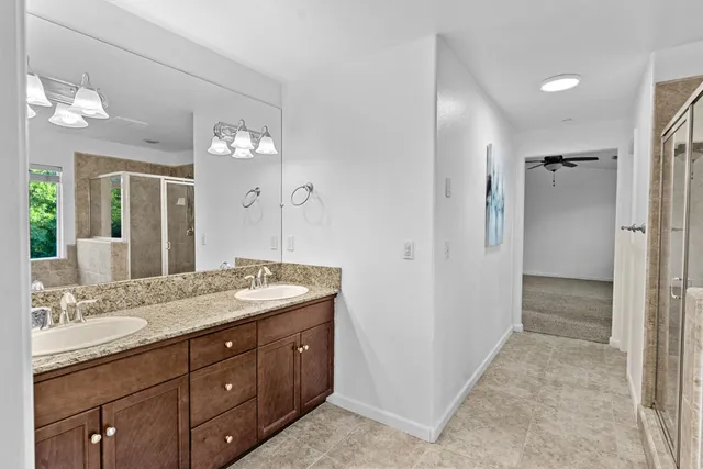 a bathroom with a tub and a shower