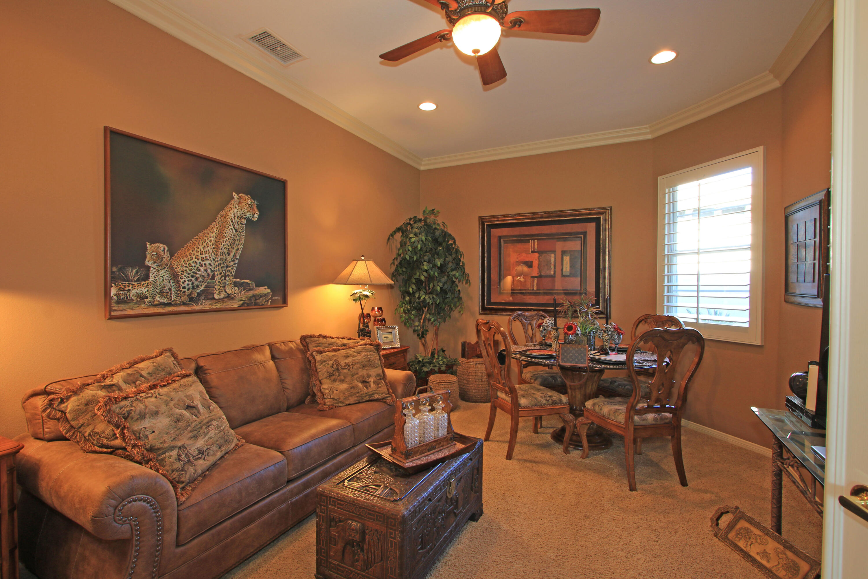 44530 Knightswood Road Indio, CA 92201 - Photo 15 of 38 a living room with furniture and a large window