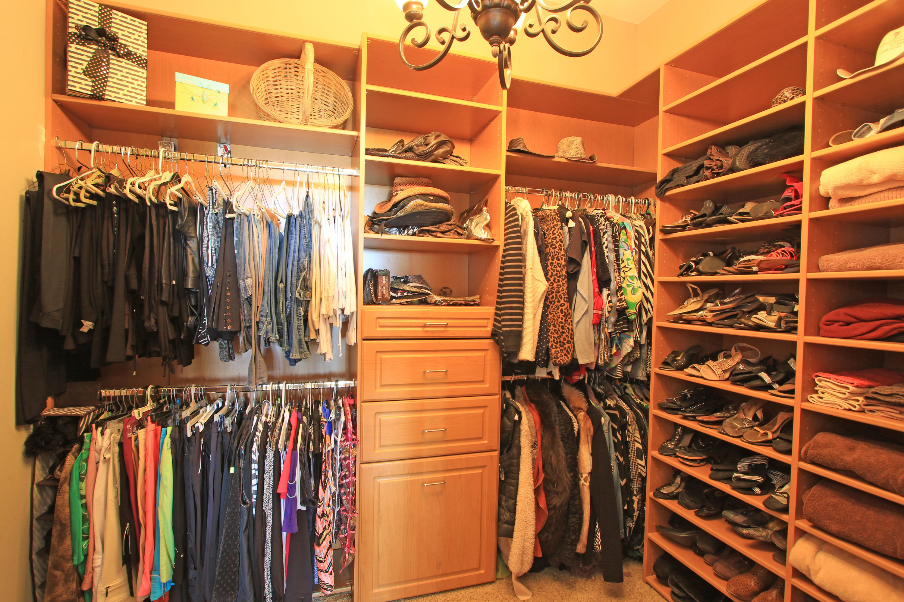 44530 Knightswood Road Indio, CA 92201 - Photo 20 of 38 a view of walk in closet with clothes
