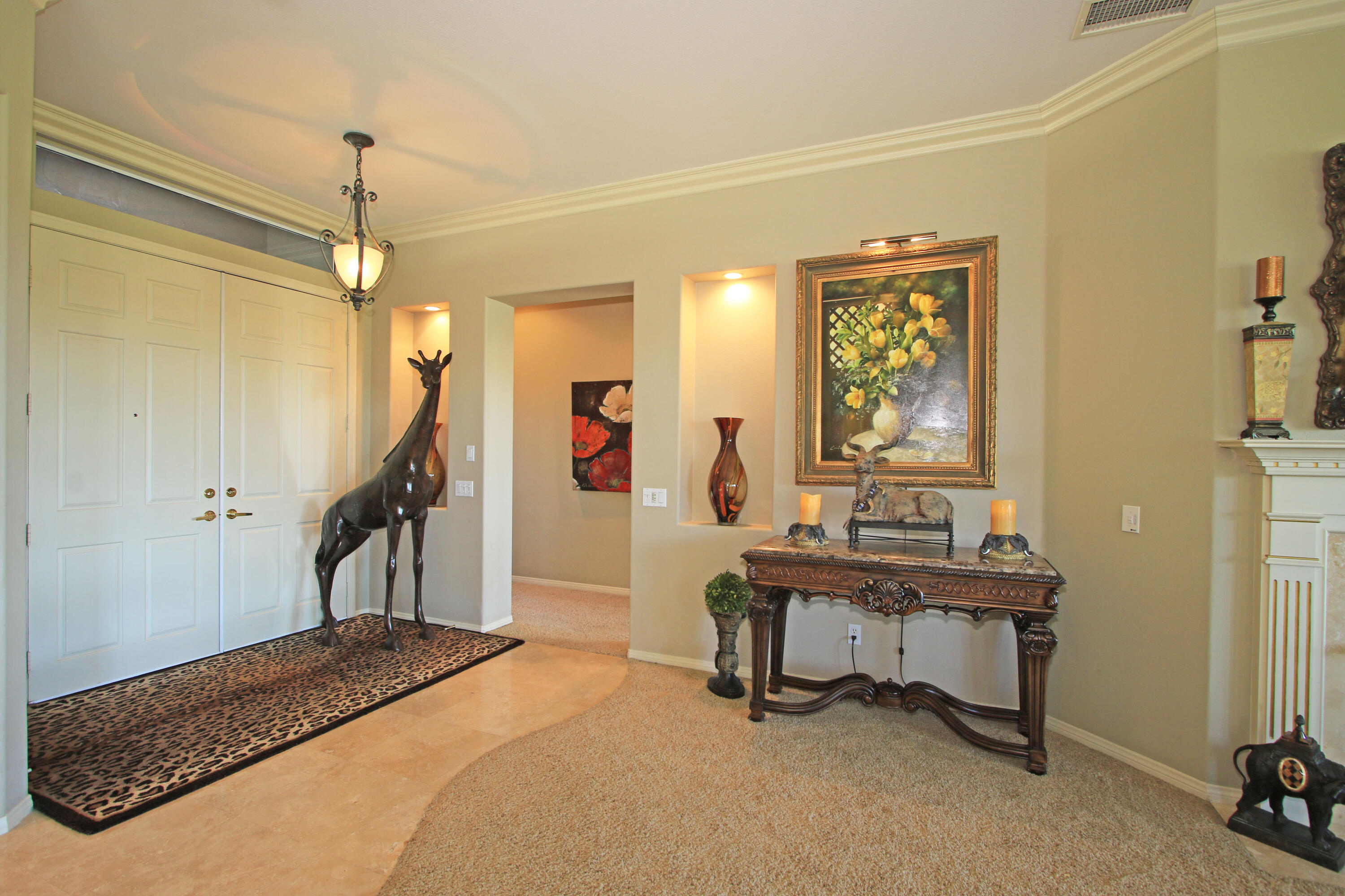 44530 Knightswood Road Indio, CA 92201 - Photo 6 of 38 a bedroom that has a bed and a table in it