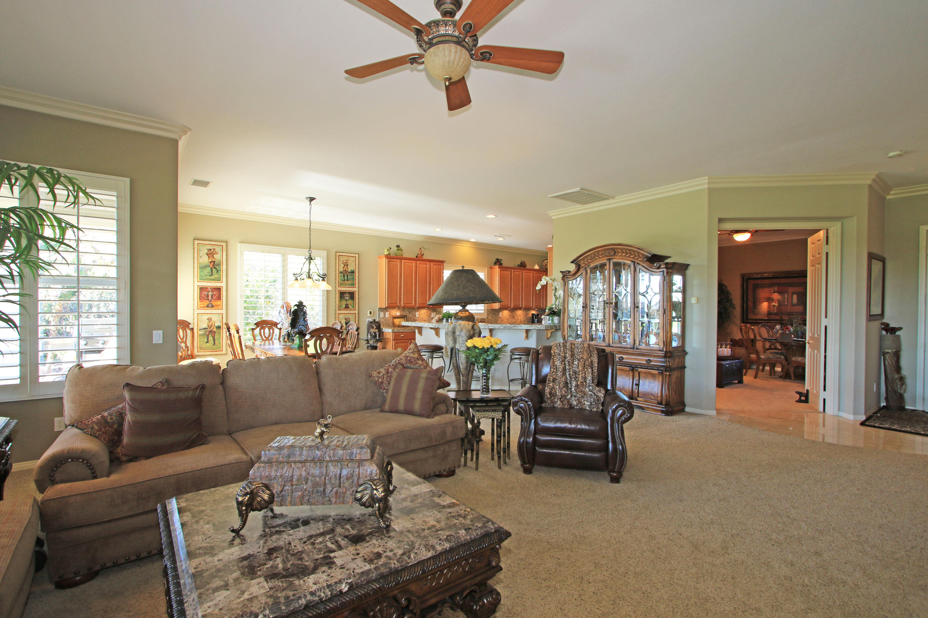 44530 Knightswood Road Indio, CA 92201 - Photo 9 of 38 a living room with furniture and view of kitchen