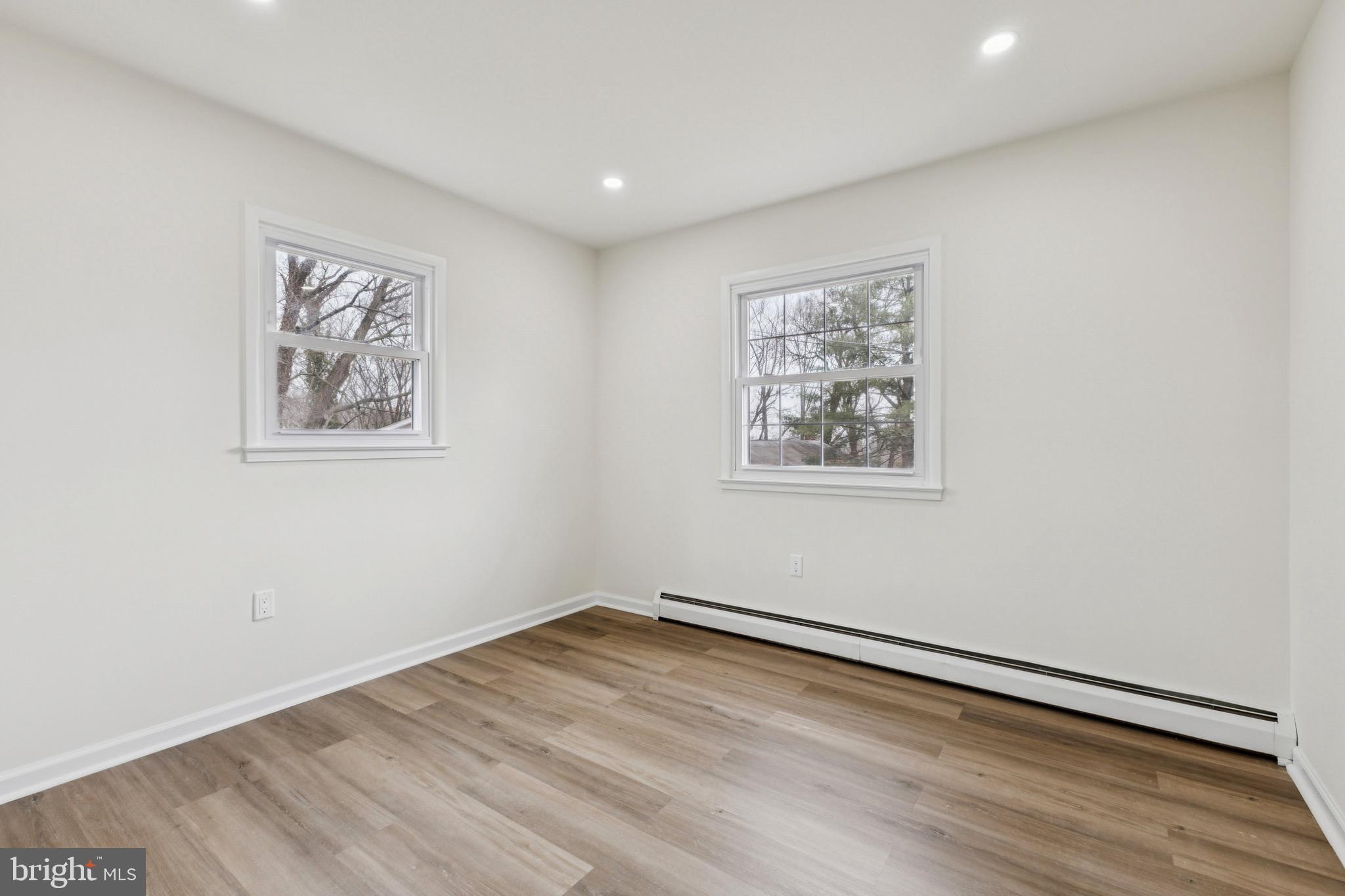 2202 Princess Anne Lane Woodbridge, VA 22191 - Photo 16 of 25 an empty room with a painting on the wall
