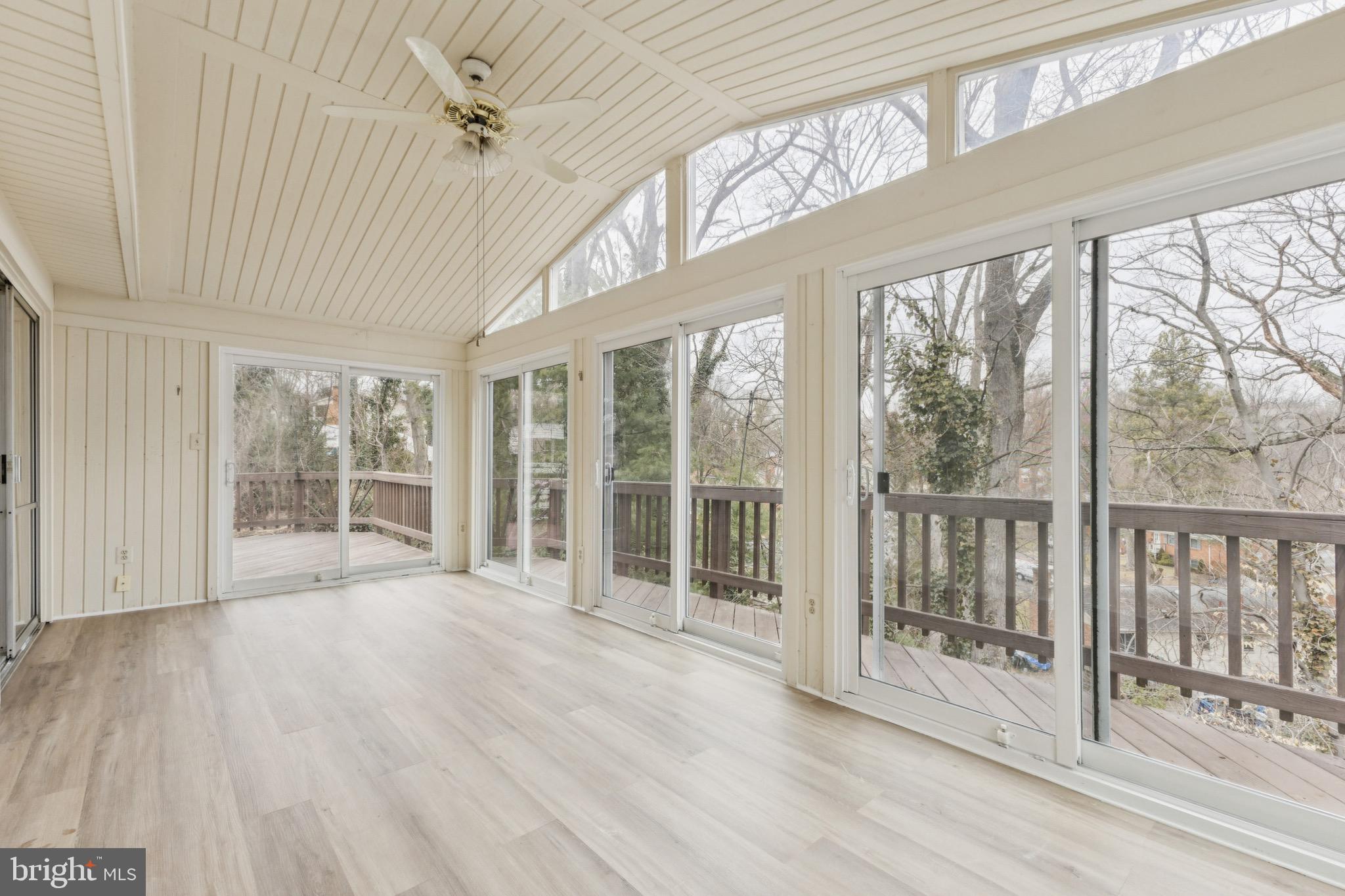2202 Princess Anne Lane Woodbridge, VA 22191 - Photo 8 of 25 a view of an empty room with wooden floor and a window