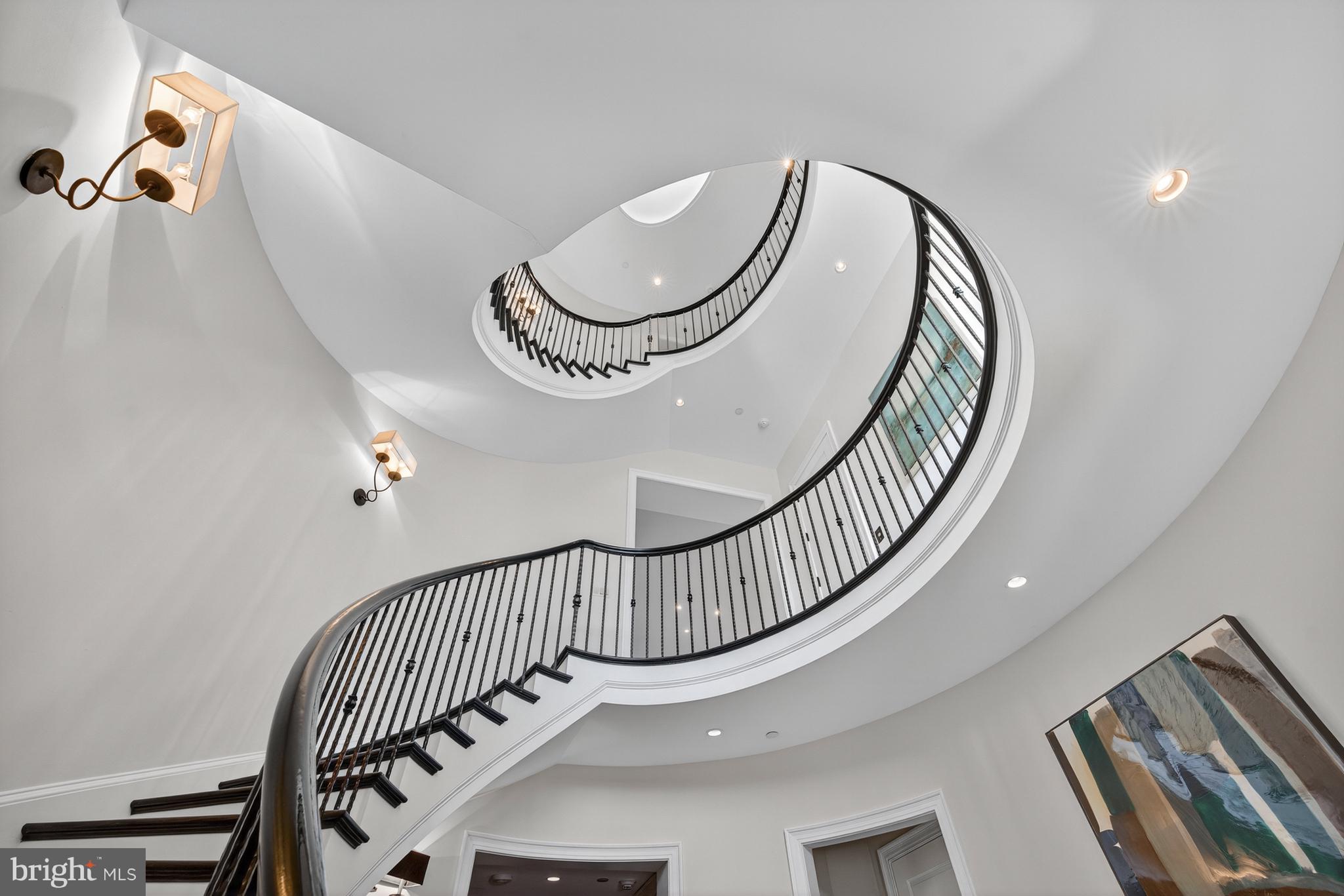 2107 Foxhall Road Northwest Washington, DC 20007 - Photo 7 of 64 A jaw-dropping Spiral Staircase welcomes you