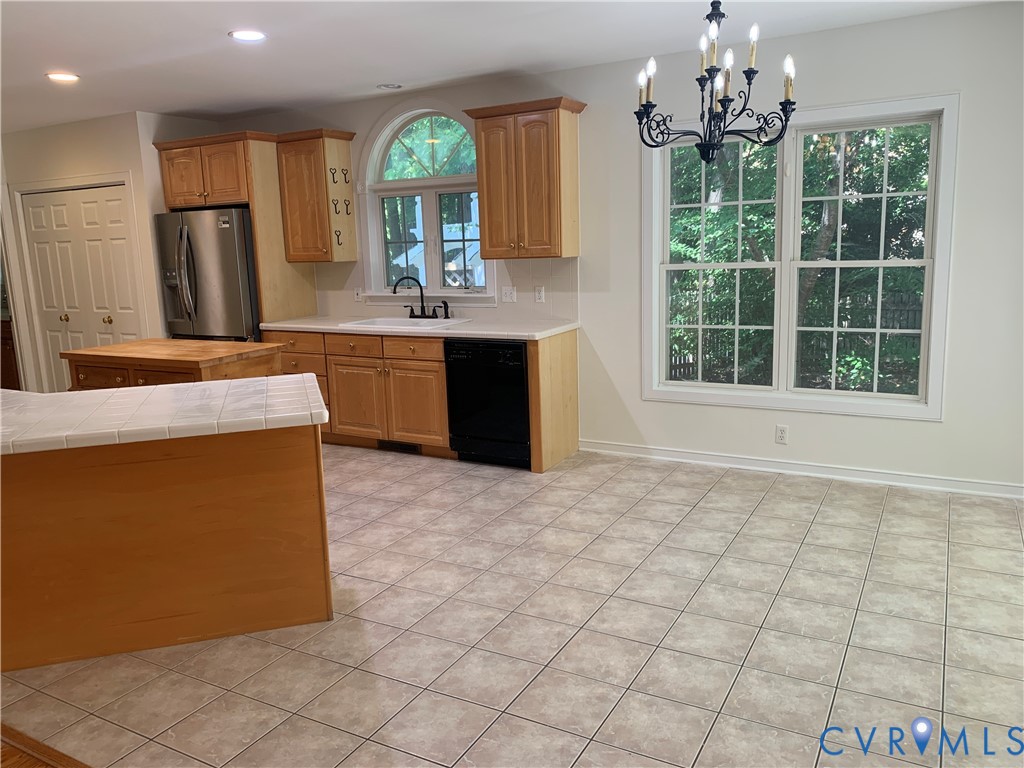 2907 Sweetspire Ridge Midlothian, VA 23113 - Photo 10 of 19 Spacious, bright Kitchen eating area with stone ti
