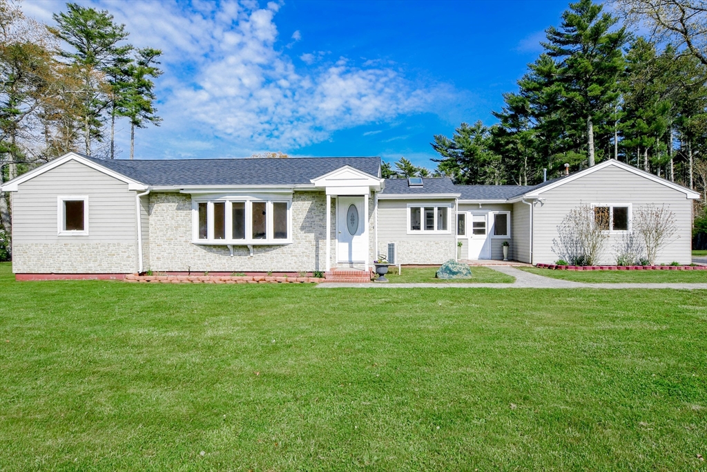 60 Mendell Road Rochester, MA 02770 - Photo 1 of 42 a front view of a house with a garden