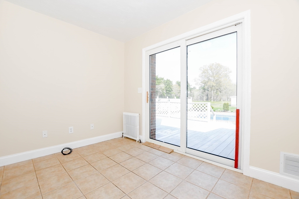 60 Mendell Road Rochester, MA 02770 - Photo 25 of 42 a view of an empty room with a window