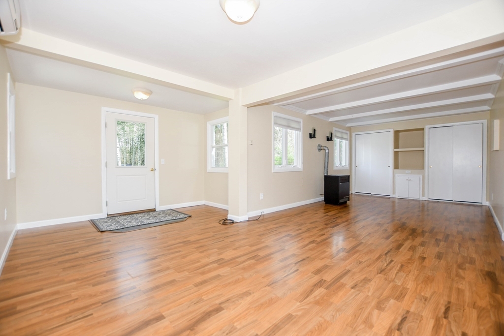 60 Mendell Road Rochester, MA 02770 - Photo 29 of 42 a view of empty room with wooden floor and fan