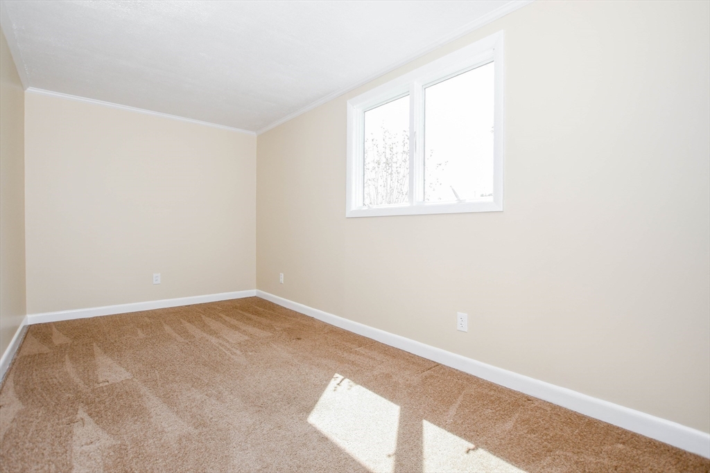 60 Mendell Road Rochester, MA 02770 - Photo 30 of 42 an empty room with a window