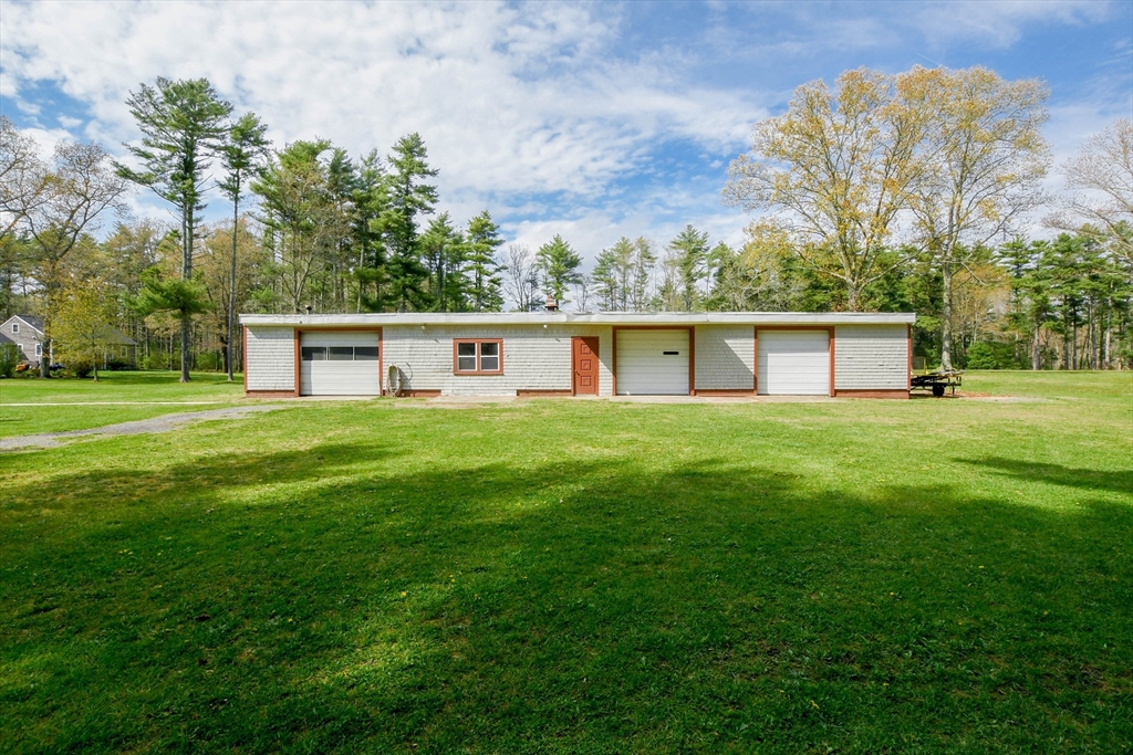 60 Mendell Road Rochester, MA 02770 - Photo 4 of 42 a house view with a play ground in front of it