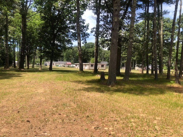 60 Mendell Road Rochester, MA 02770 - Photo 6 of 42 a view of swimming pool with trees