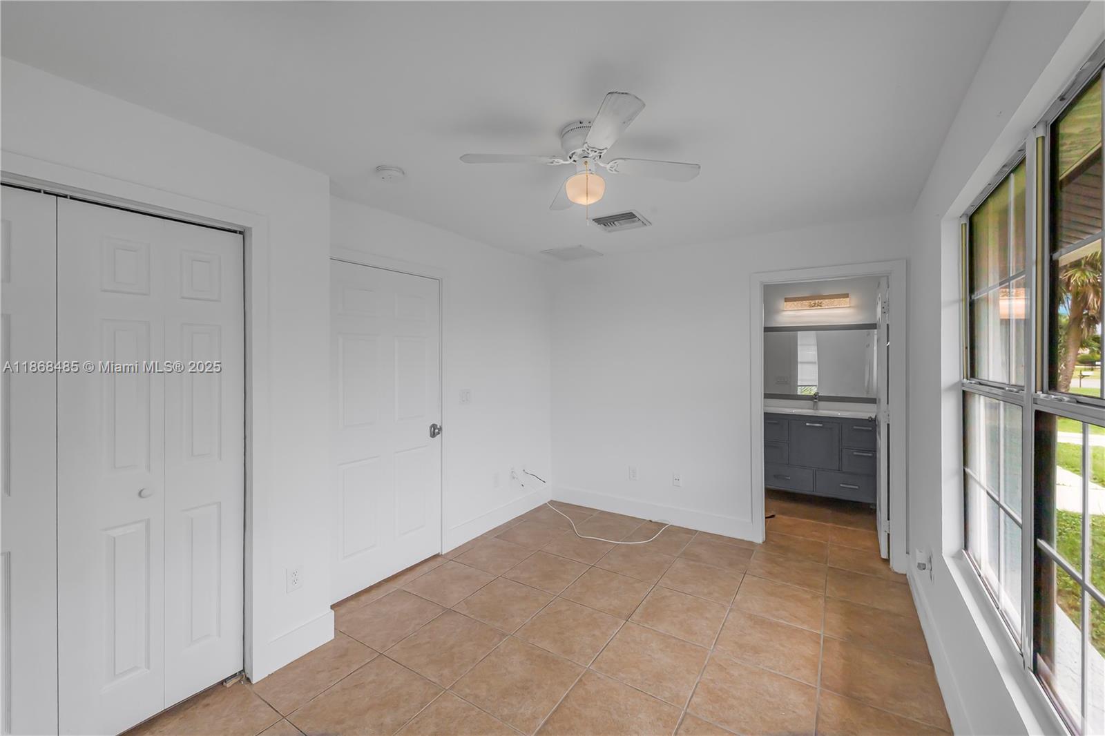 804 Monroe, Unit DR LaBelle, FL 33936 - Photo 5 of 10 a view of an empty room with a window