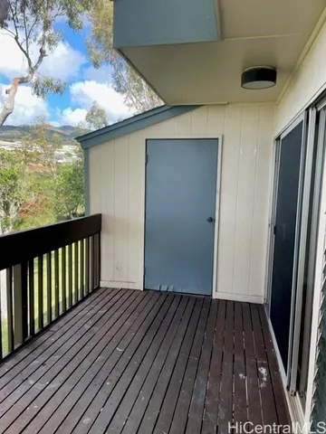 a view of backyard with wooden floor