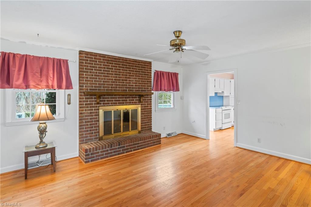 142 Cameron Road Lexington, NC 27295 - Photo 13 of 41 Den Fireplace with Natural Gas Logs